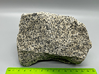 a gray crystalline rock with small light gray and black crystals